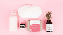 Load image into Gallery viewer, Boobie box from in good company is the perfect breastfeeding kit; with water bottle, reusable breast pads, lactation tea, nipple relief, and booby tubes
